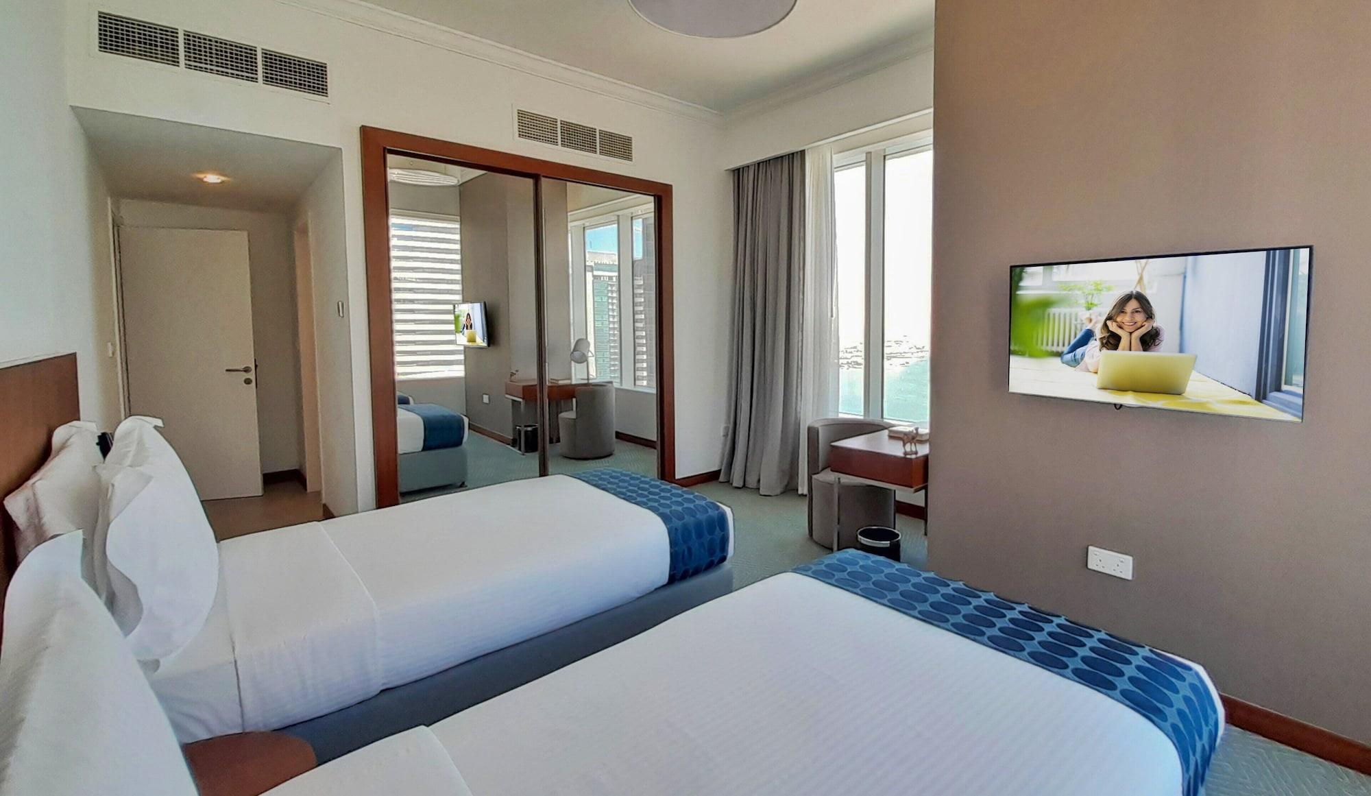 Somerset West Bay Doha Kültér fotó A bedroom at the hotel
