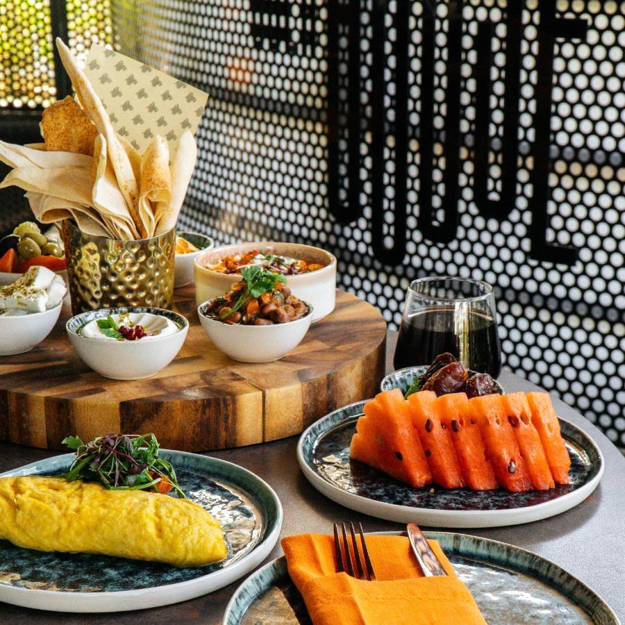 Somerset West Bay Doha Kültér fotó A selection of dishes at the restaurant