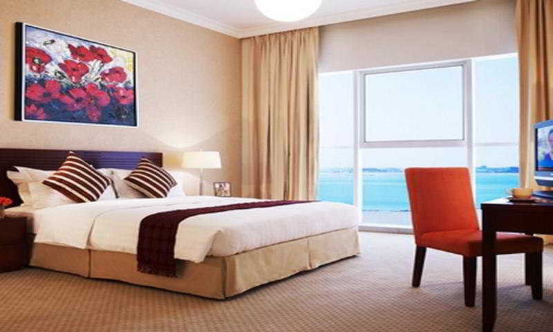 Somerset West Bay Doha Kültér fotó A bedroom at the hotel