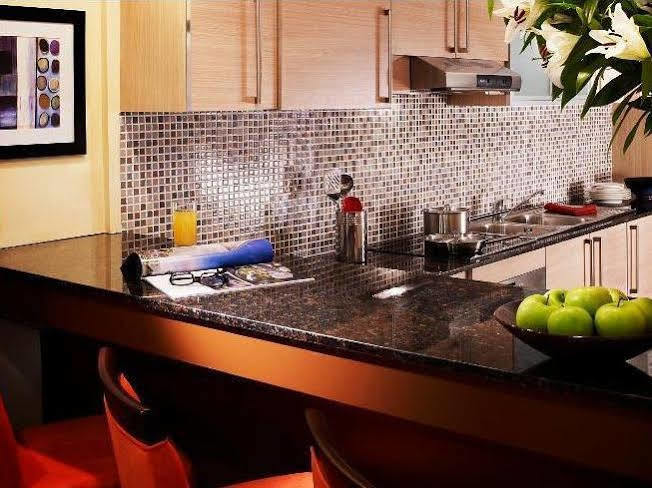 Somerset West Bay Doha Kültér fotó A kitchen with granite countertops